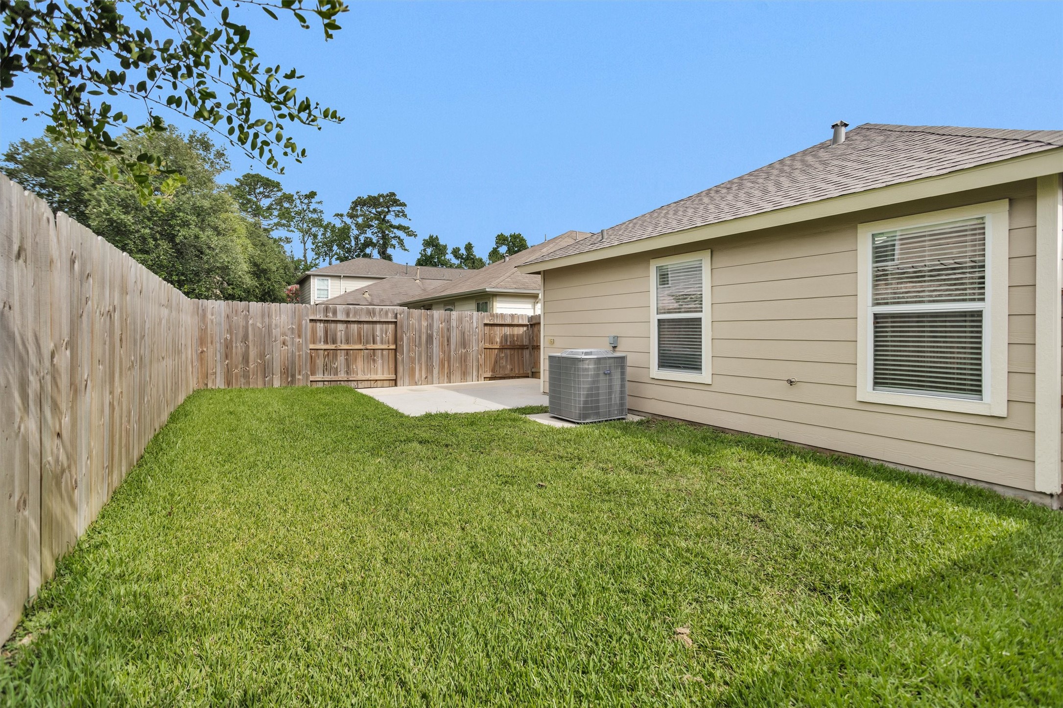 3131 Beacon Grove Street Spring, TX 77389 - Photo 32 of 38 a view of a house with a backyard