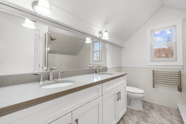 a bathroom with a sink and a shower