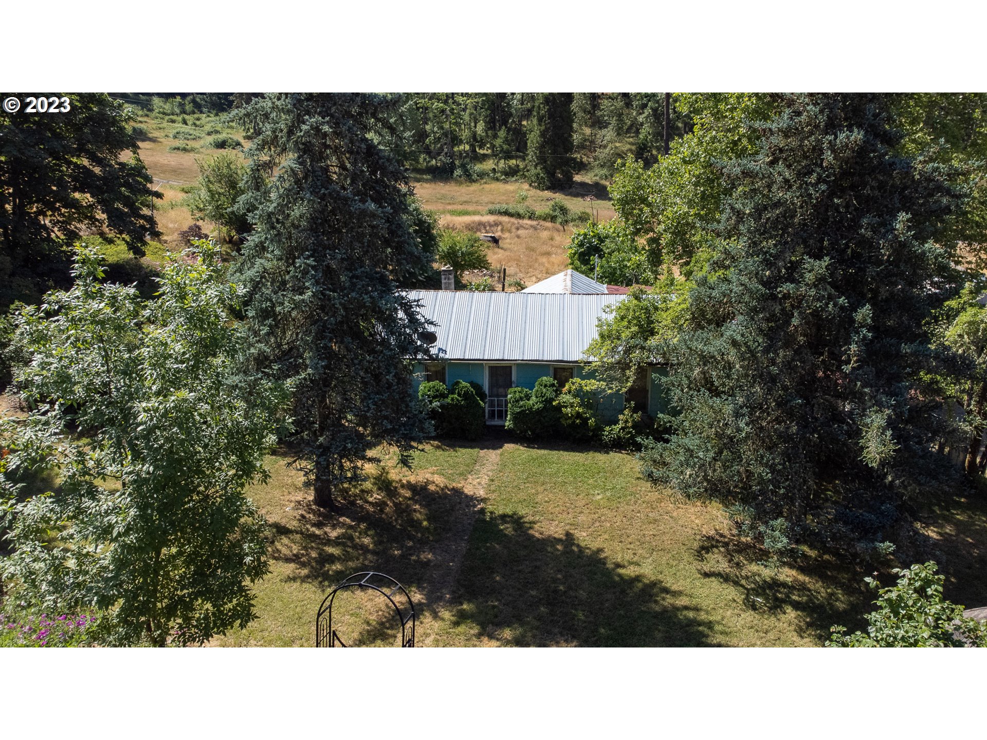 1805 Shoestring Road Riddle, OR 97469 - Photo 2 of 30 a black and white photo of a house