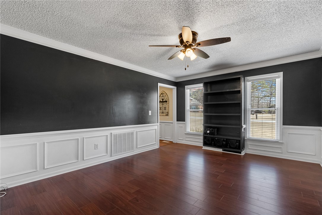 112 C-10-220 Anderson, SC 29621 - Photo 9 of 45 This versatile space features rich hardwood floors and bright windows, perfect for relaxation or productivity.