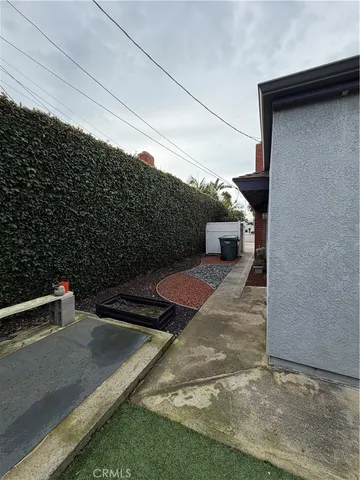 a kitchen with a refrigerator and a stove