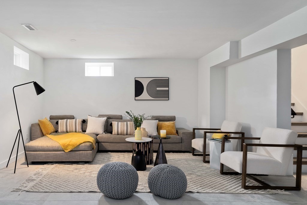 51 Eliot Road Arlington, MA 02474 - Photo 11 of 42 a bedroom with furniture and a couch