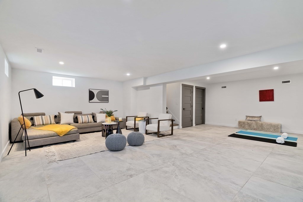 51 Eliot Road Arlington, MA 02474 - Photo 12 of 42 a living room with furniture and wooden floor