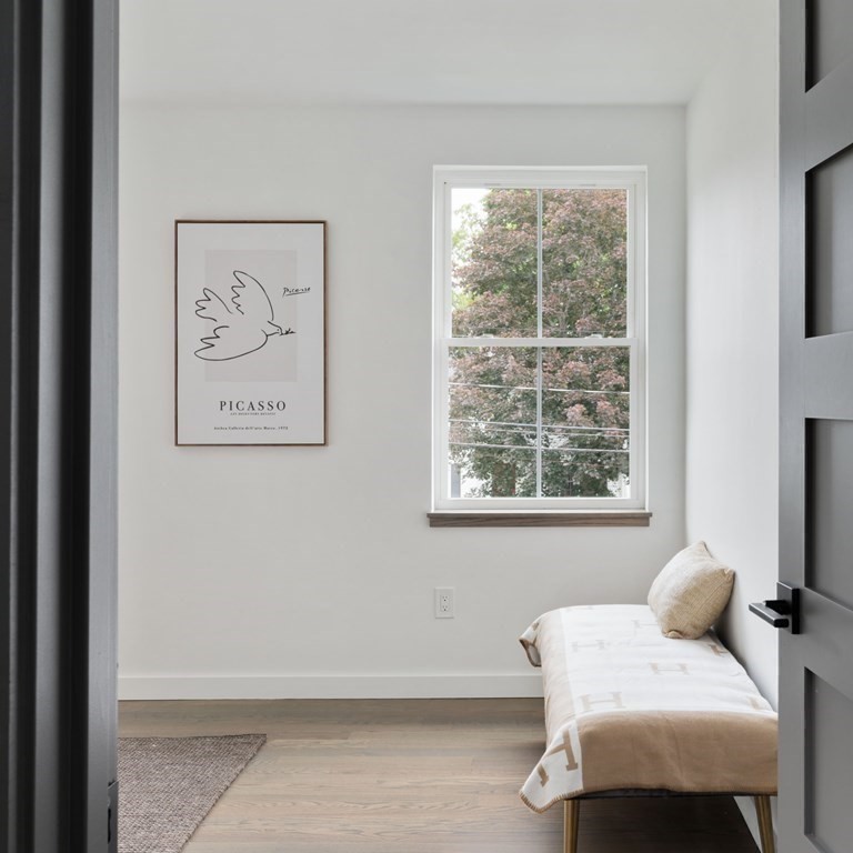 51 Eliot Road Arlington, MA 02474 - Photo 16 of 42 a bedroom with a bed and a window