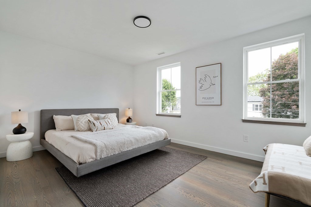 51 Eliot Road Arlington, MA 02474 - Photo 17 of 42 a bedroom with a bed and a window