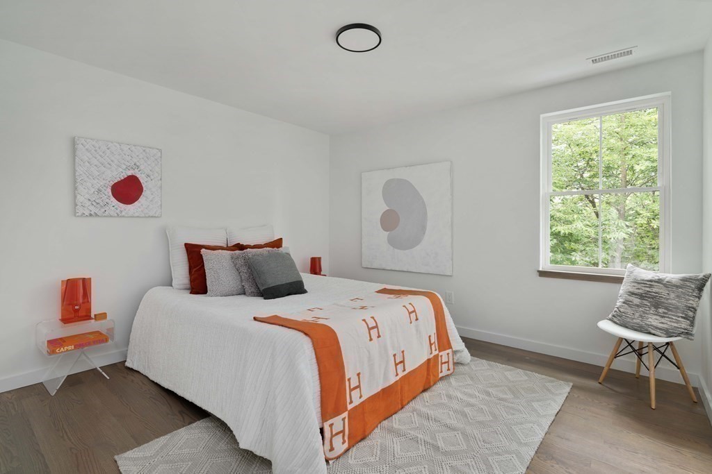 51 Eliot Road Arlington, MA 02474 - Photo 21 of 42 a bedroom with a bed and a window