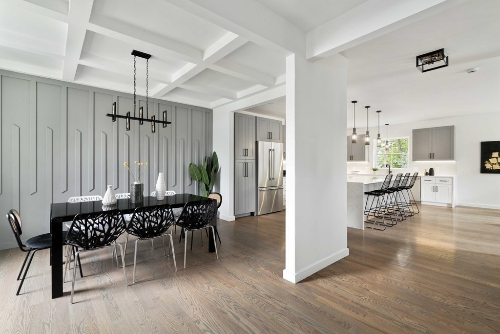 51 Eliot Road Arlington, MA 02474 - Photo 23 of 42 a view of a dining room with furniture window and wooden floor