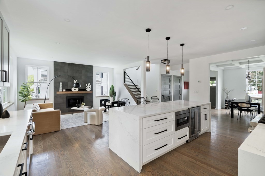 51 Eliot Road Arlington, MA 02474 - Photo 29 of 42 a living room with furniture and a wooden floor