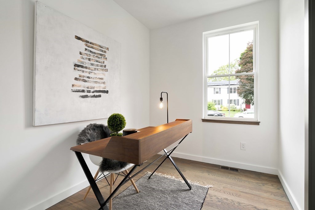 51 Eliot Road Arlington, MA 02474 - Photo 31 of 42 a workspace with furniture and a window