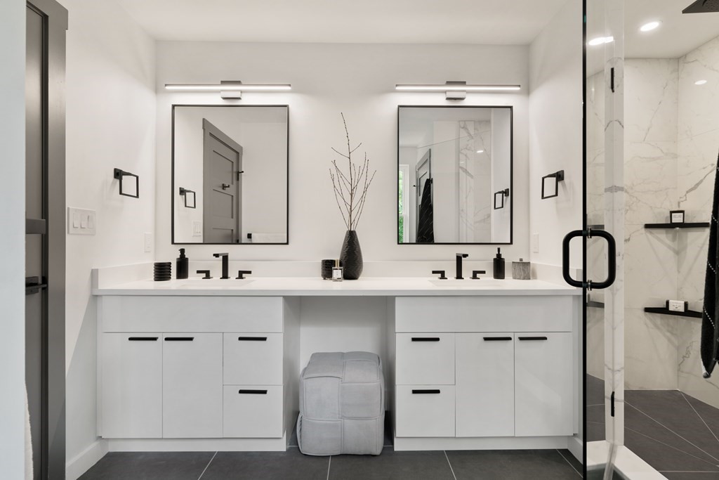 51 Eliot Road Arlington, MA 02474 - Photo 39 of 42 a bathroom with a double vanity sink mirror and