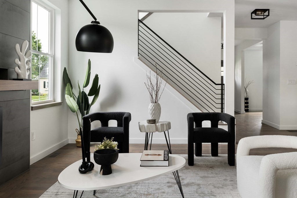 51 Eliot Road Arlington, MA 02474 - Photo 5 of 42 a living room with furniture and a wooden floor