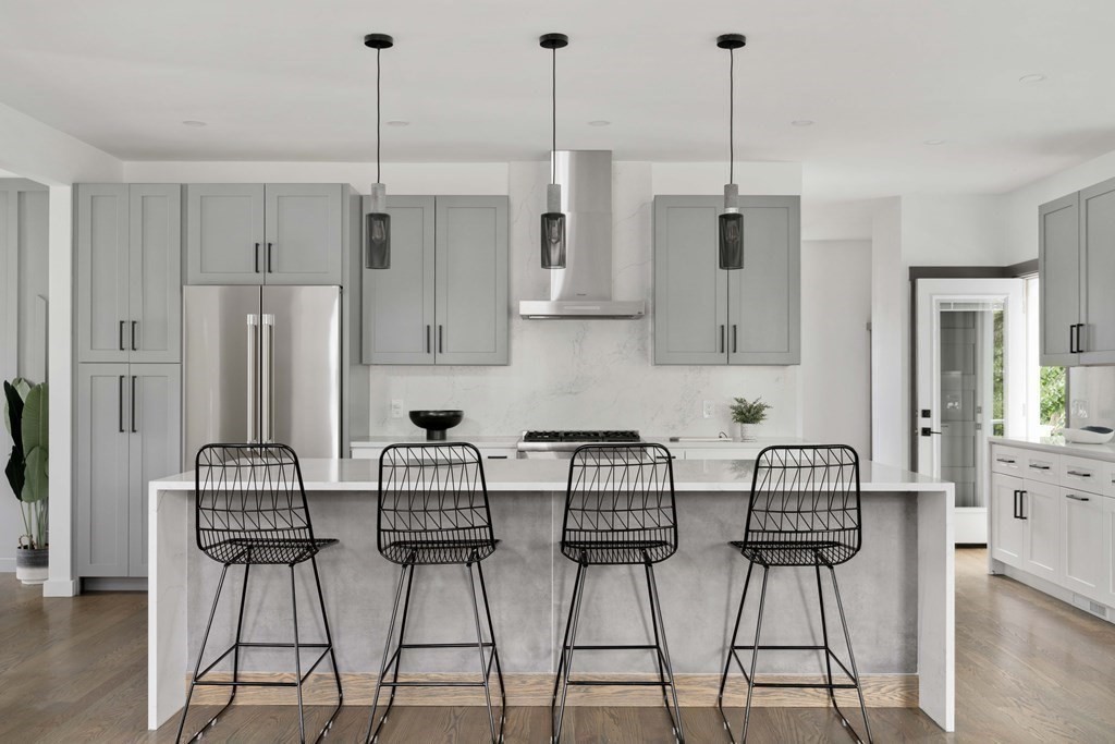 51 Eliot Road Arlington, MA 02474 - Photo 8 of 42 a view of kitchen island with stainless steel appliances