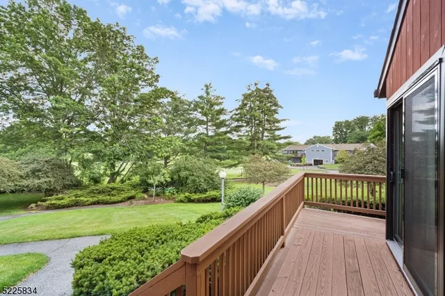 a view of balcony and yard