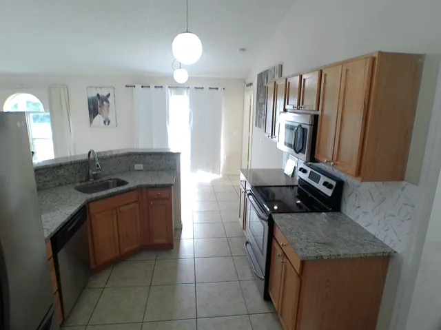 $359,900 | 4226 Southwest Ragen Street, Port St. Lucie, FL 34953