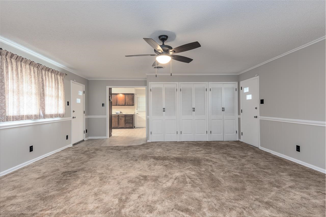 4888 Dee Road Memphis, TN 38117 - Photo 8 of 18 a view of an empty room with a window