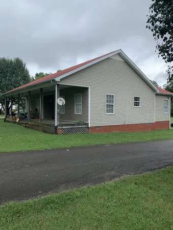 a house view with a garden space