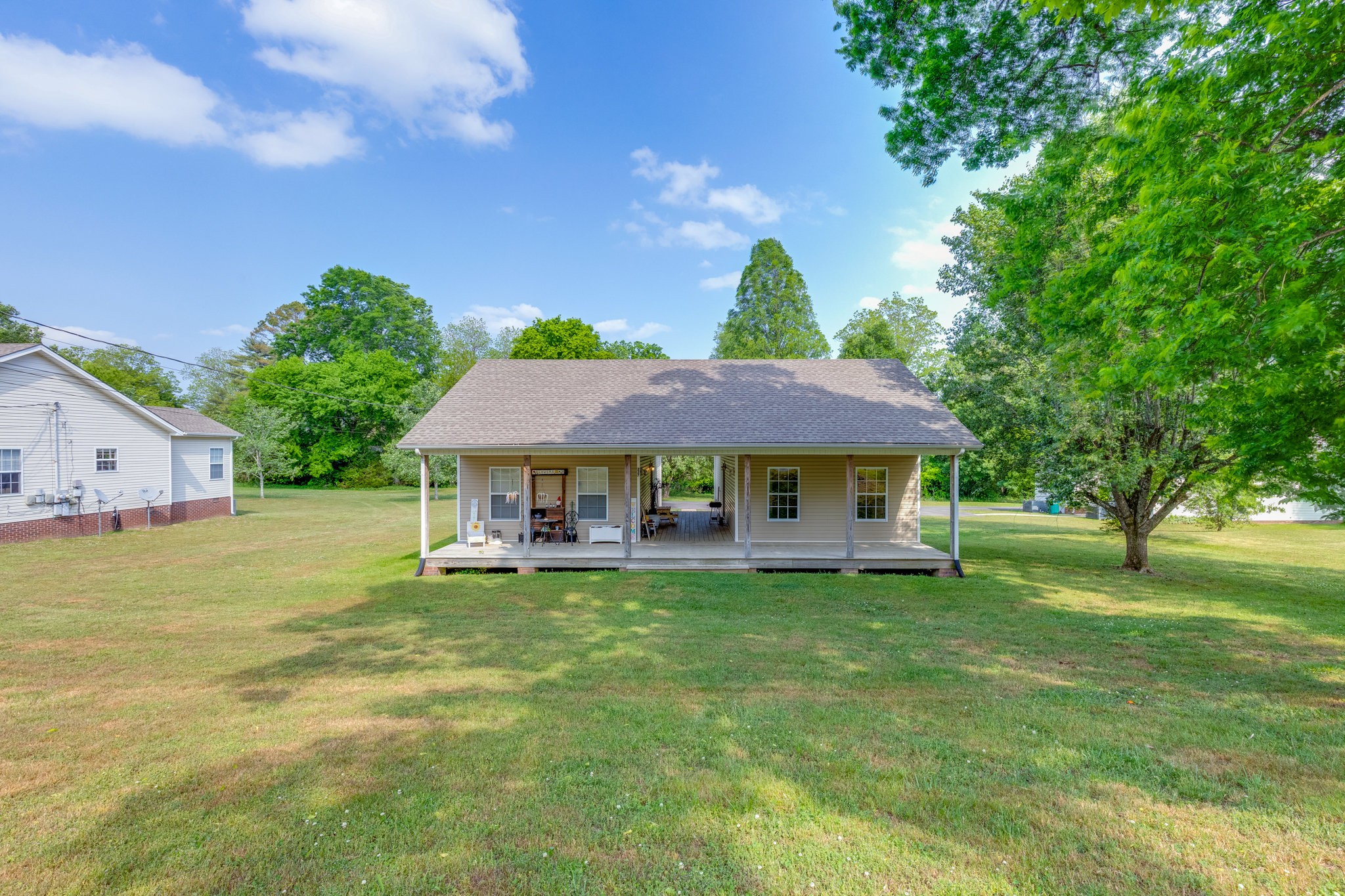 225 Locust Street Pulaski, TN 38478 - Photo 28 of 44 a big house with a big yard and large trees