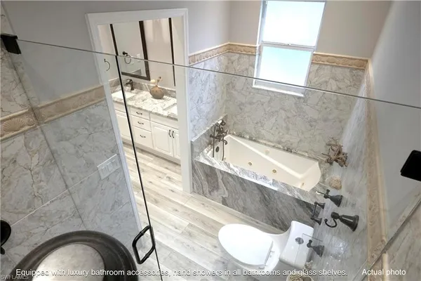 a kitchen with stainless steel appliances a refrigerator sink and stove
