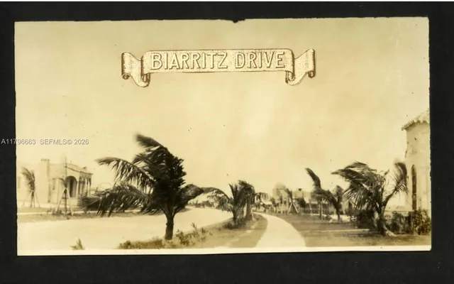 a view of a street with a view of the ocean