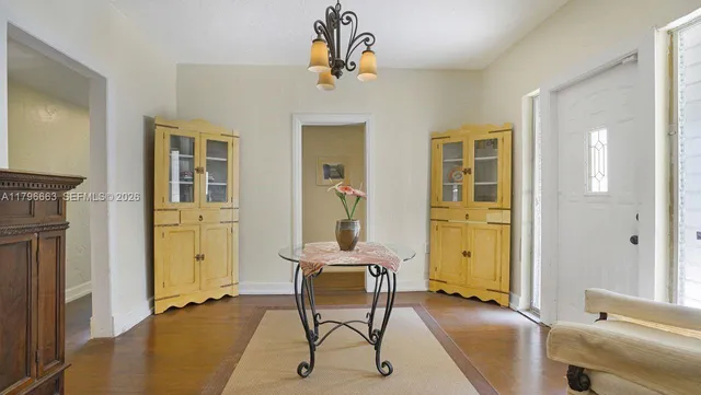 a view of a livingroom with furniture and windows