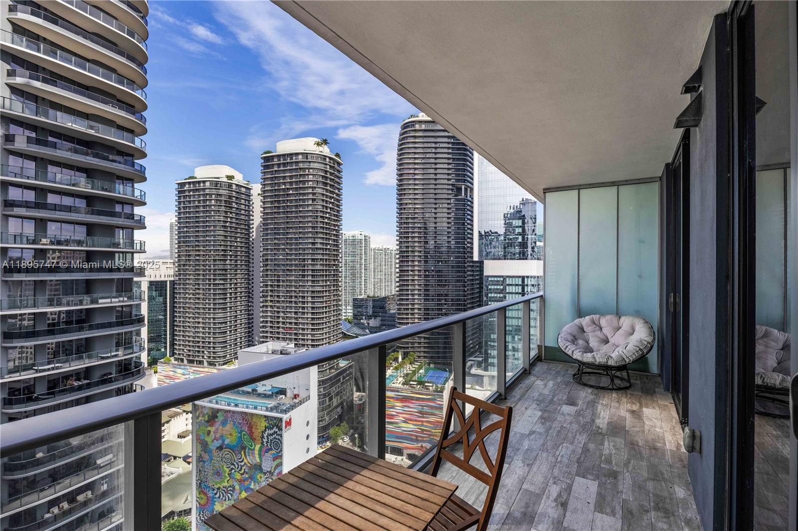 1010 Brickell Avenue, Unit 3208 Miami, FL 33131 - Photo 13 of 15 a view of balcony with wooden floor