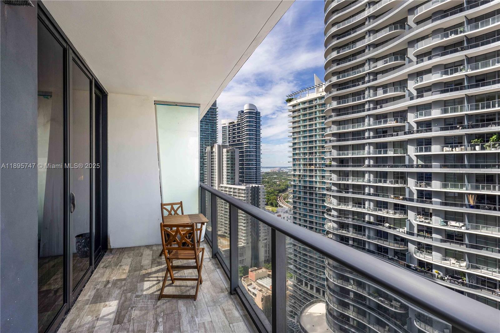 1010 Brickell Avenue, Unit 3208 Miami, FL 33131 - Photo 14 of 15 a balcony with view of outdoor space