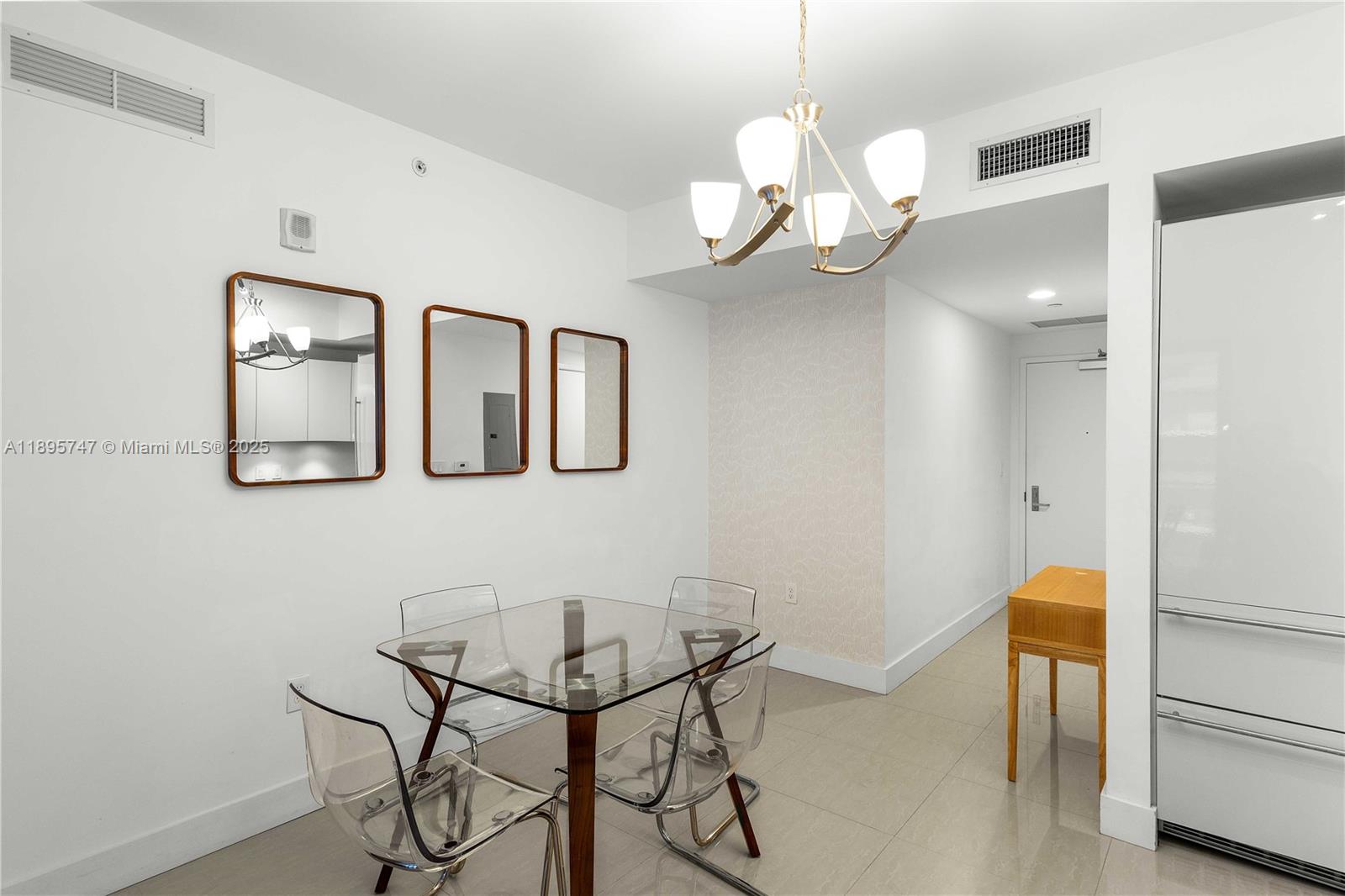 1010 Brickell Avenue, Unit 3208 Miami, FL 33131 - Photo 6 of 15 a view of a dining room with furniture