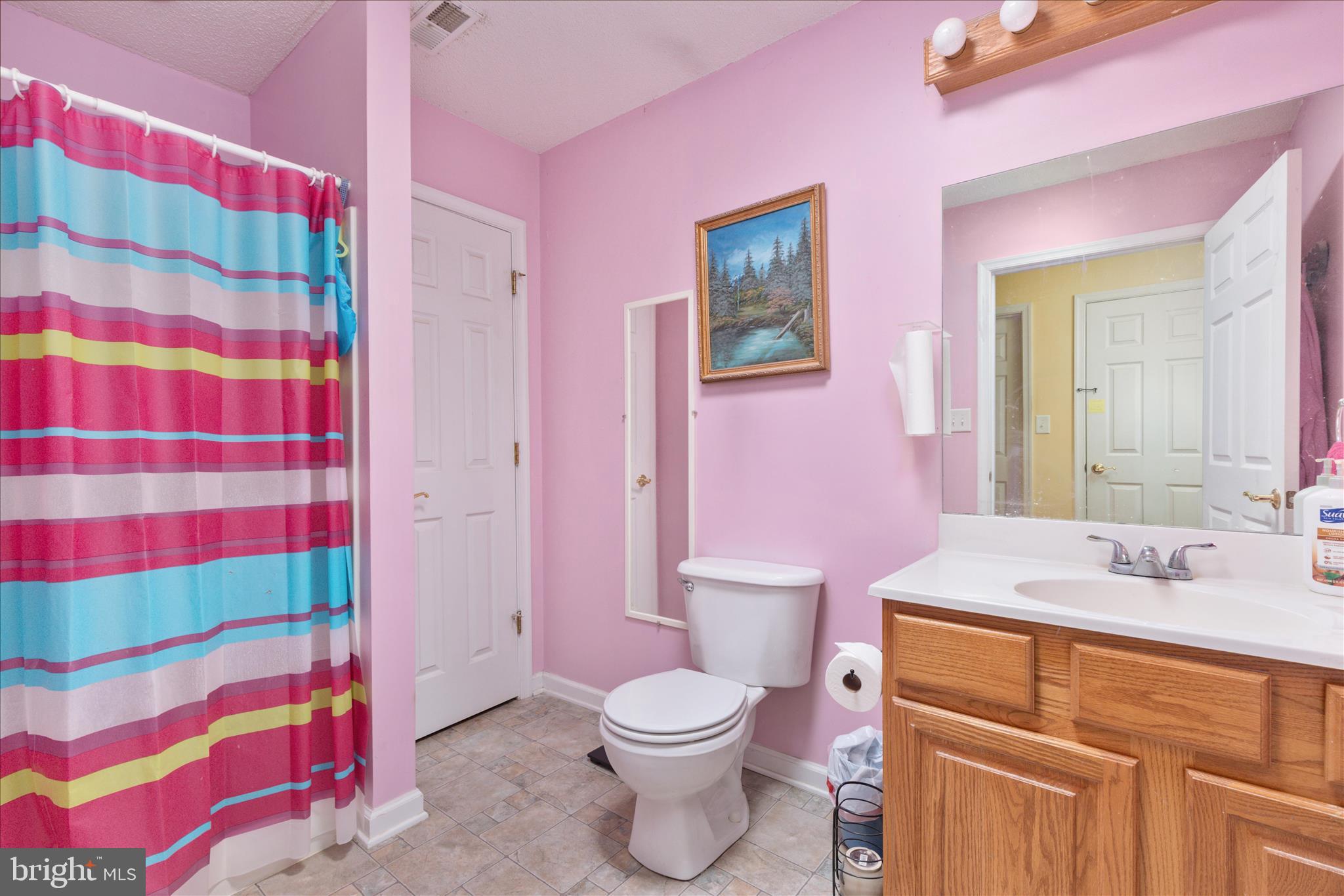 205 Clyde Borum Road Inwood, WV 25428 - Photo 15 of 46 a bathroom with a sink toilet and shower