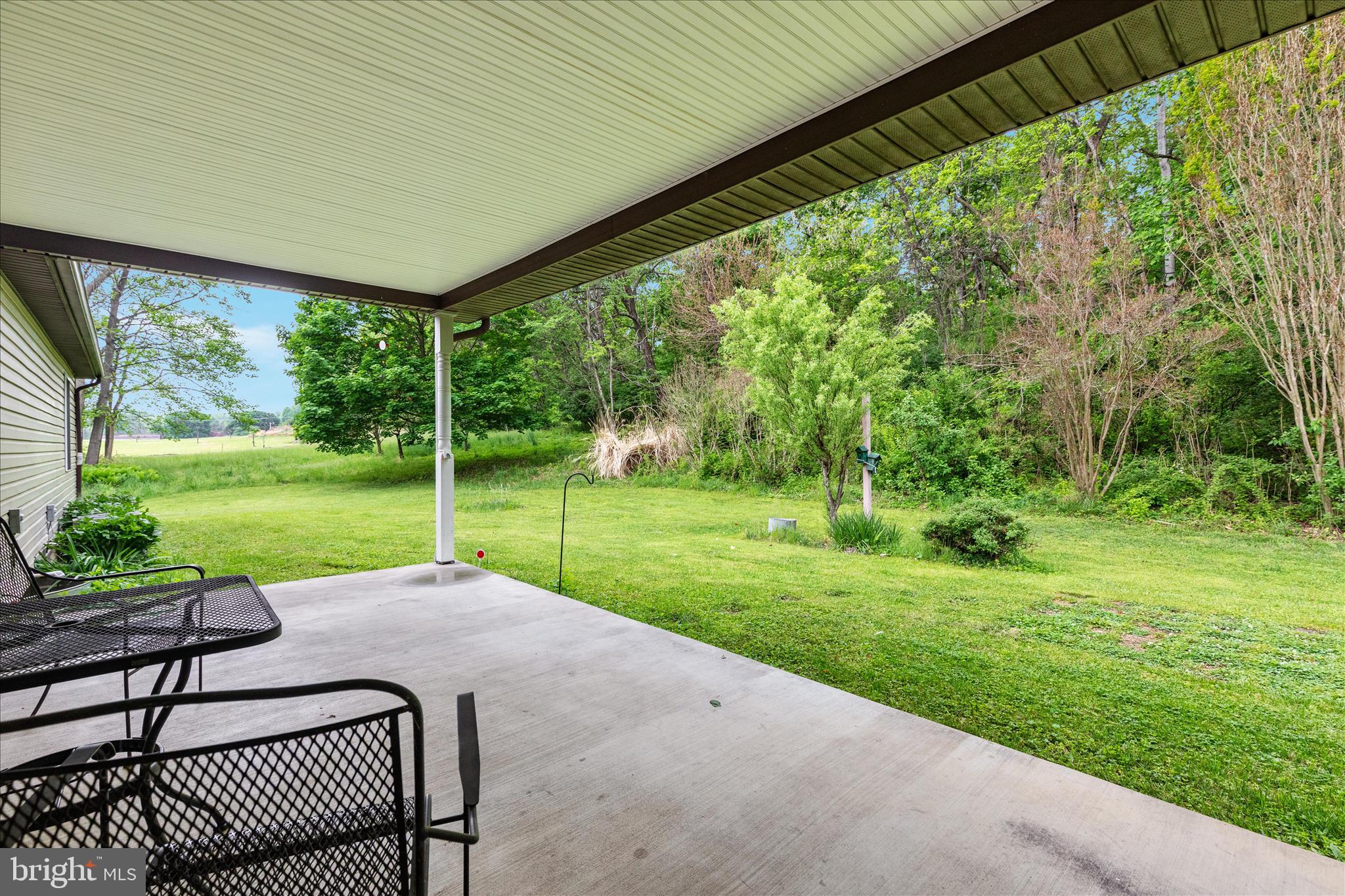 205 Clyde Borum Road Inwood, WV 25428 - Photo 29 of 46 a view of a patio with a backyard