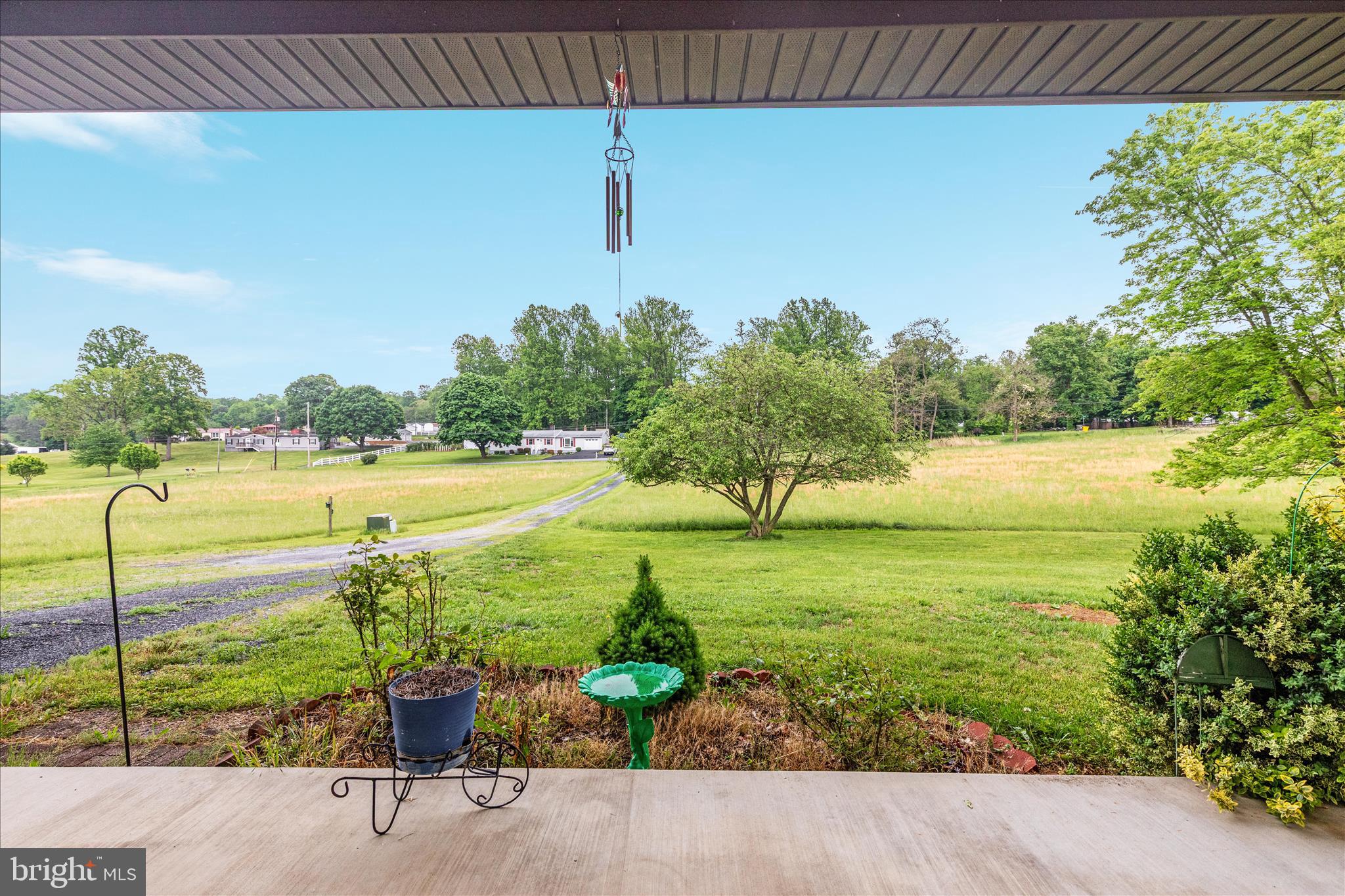 205 Clyde Borum Road Inwood, WV 25428 - Photo 31 of 46 a view of a lake with a outdoor space