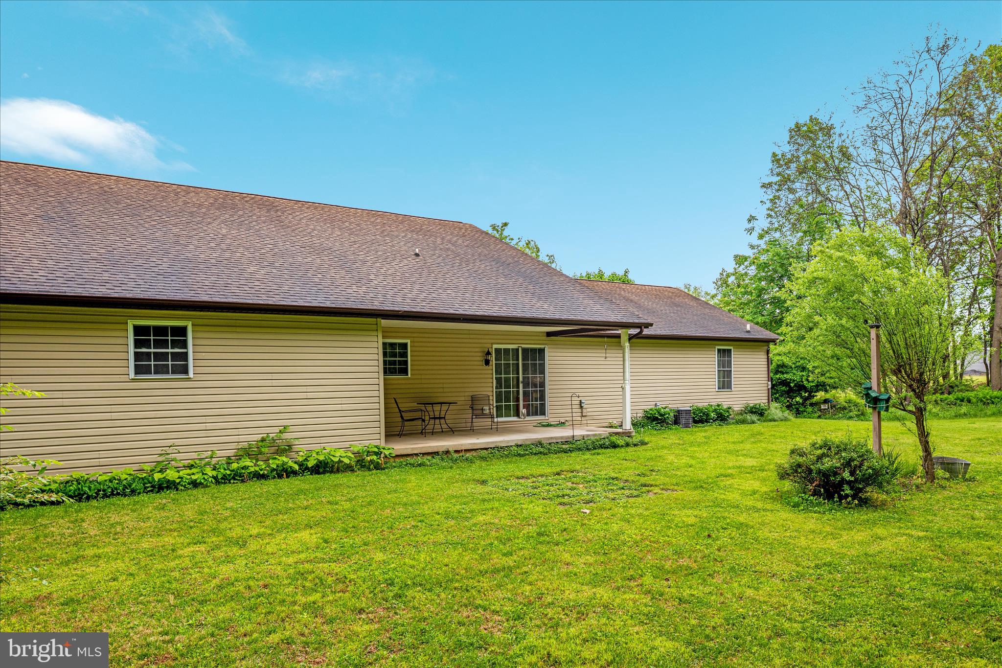 205 Clyde Borum Road Inwood, WV 25428 - Photo 45 of 46 a front view of house with yard and green space
