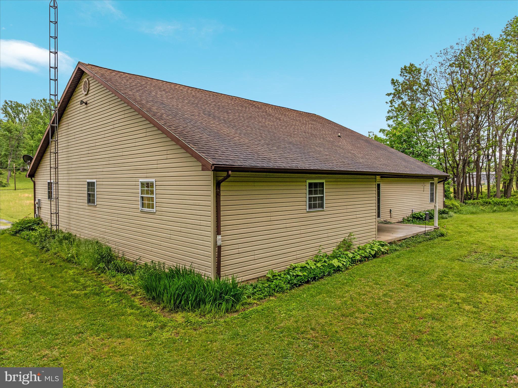 205 Clyde Borum Road Inwood, WV 25428 - Photo 46 of 46 a front view of a house with a yard