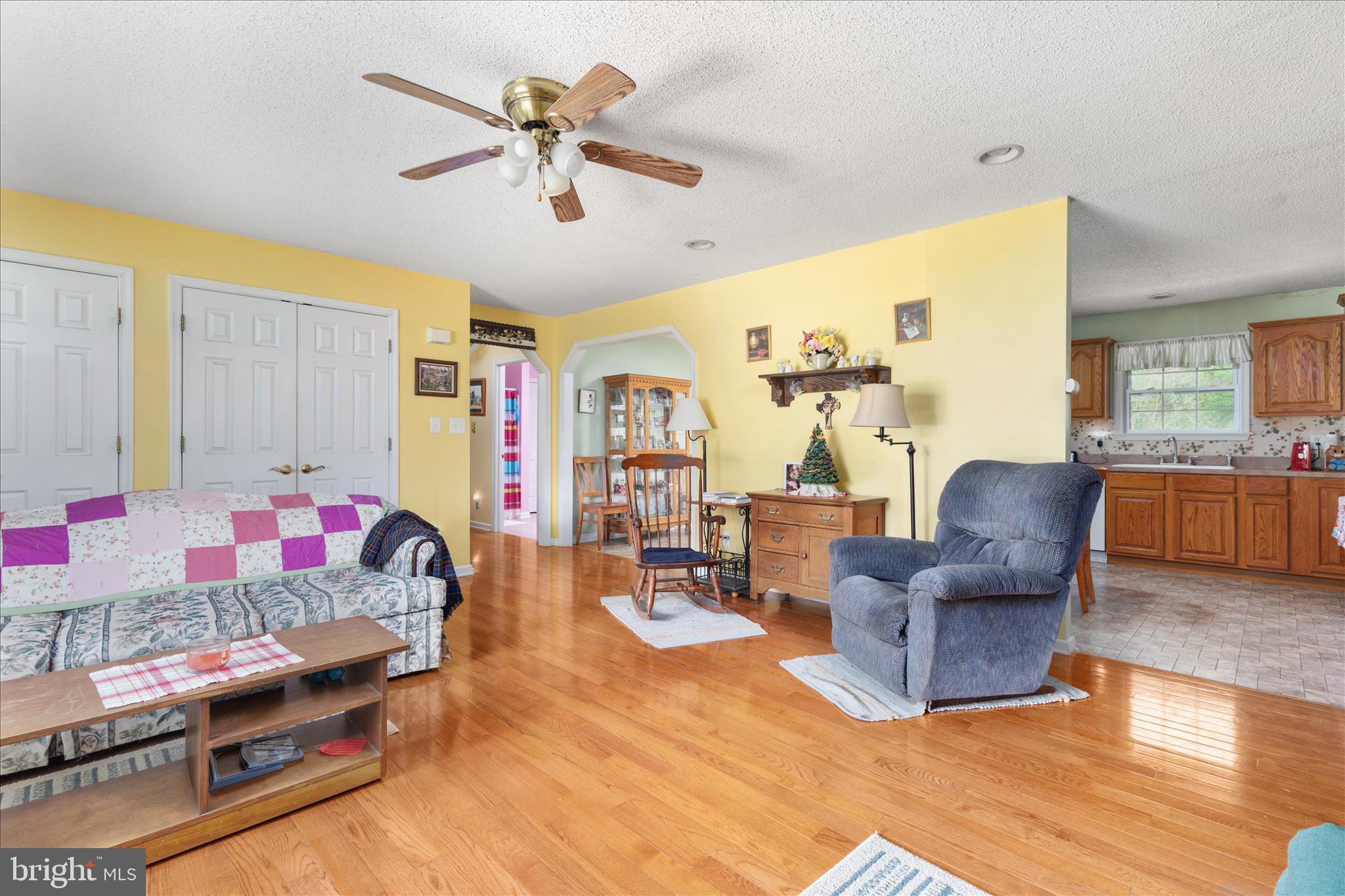 205 Clyde Borum Road Inwood, WV 25428 - Photo 8 of 46 a living room with furniture and kitchen view