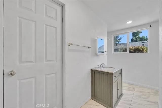 a view of a hallway with workspace