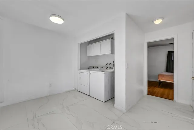 a room with a washer and dryer