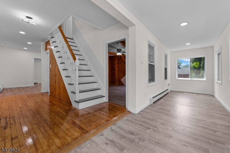 113 Rt560 Layton, NJ 07851 - Photo 2 of 17 wooden view of a hallway with stairs and wooden floor