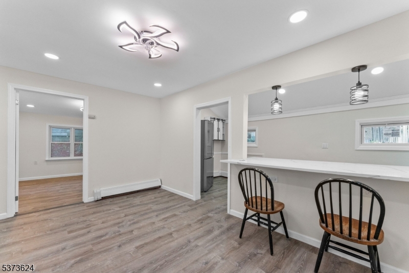 113 Rt560 Layton, NJ 07851 - Photo 6 of 17 a view of a dining room with furniture and wooden floor