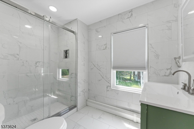 113 Rt560 Layton, NJ 07851 - Photo 9 of 17 a bathroom with a sink toilet and shower