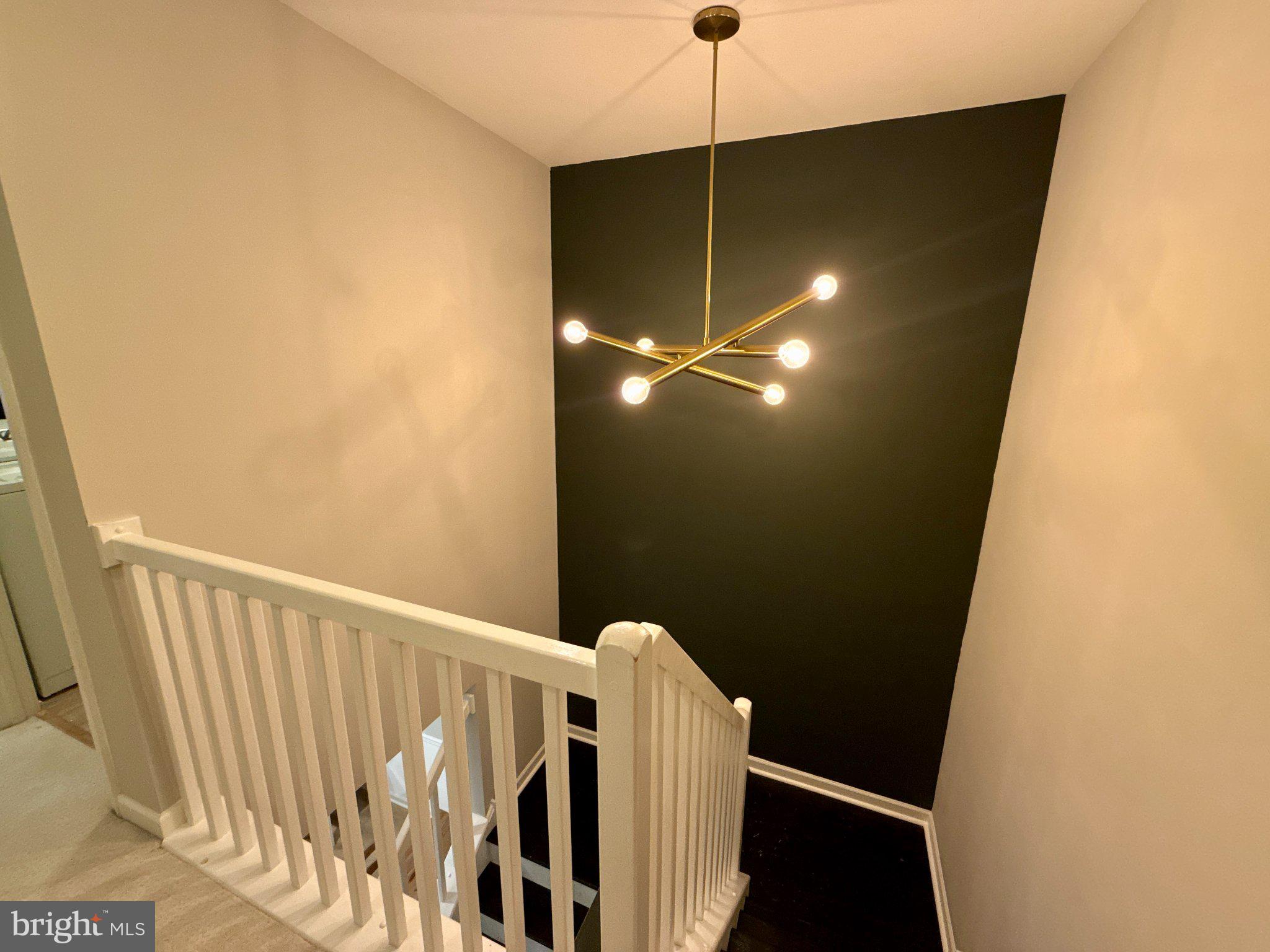 267 Flagstone Road, Unit 6 Chester Springs, PA 19425 - Photo 19 of 27 Modern staircase with stylish lighting.