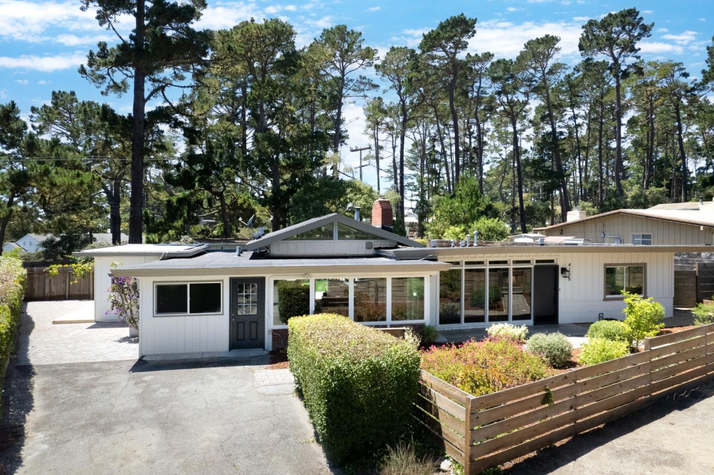 4138 Crest Road Pebble Beach, CA 93953 - Photo 2 of 38 a house view with a seating space and garden view
