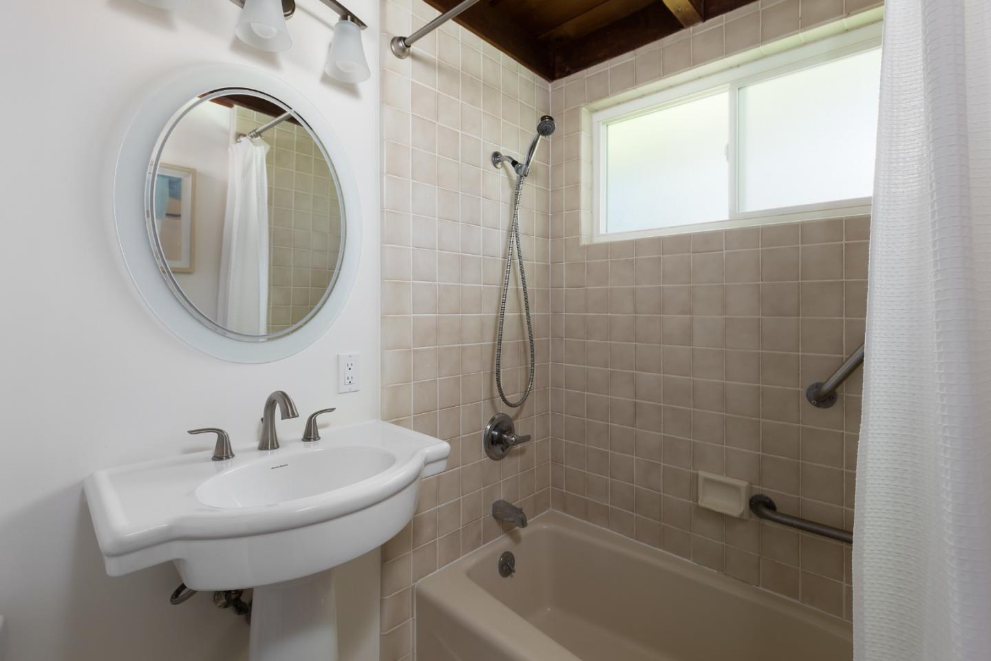 4138 Crest Road Pebble Beach, CA 93953 - Photo 24 of 38 a bathroom with a sink a toilet and shower