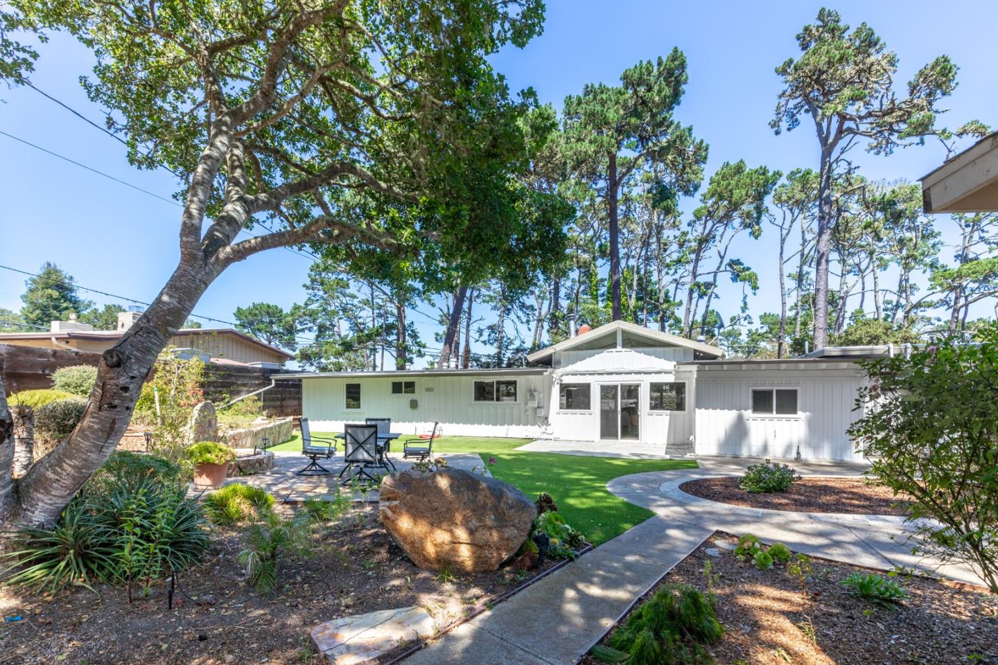 4138 Crest Road Pebble Beach, CA 93953 - Photo 29 of 38 a front view of house with yard and green space