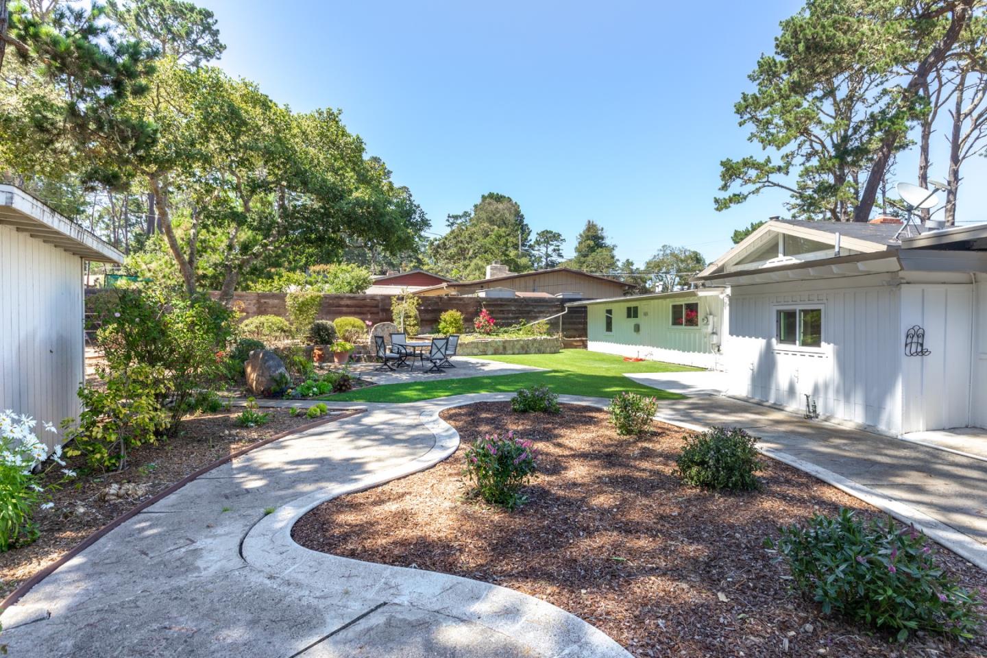 4138 Crest Road Pebble Beach, CA 93953 - Photo 30 of 38 a view of a house with a garden