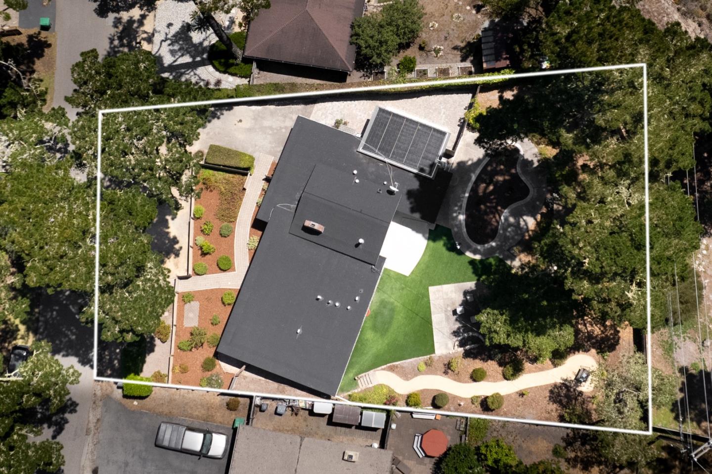 4138 Crest Road Pebble Beach, CA 93953 - Photo 36 of 38 an aerial view of a house with a yard