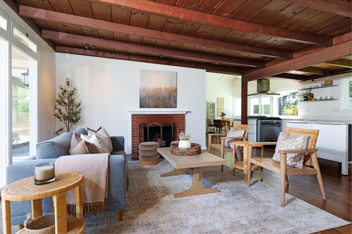 4138 Crest Road Pebble Beach, CA 93953 - Photo 5 of 38 a living room with furniture a fireplace and a table