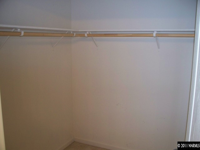 10065 Silver Star Drive Reno, NV 89521 - Photo 8 of 13 a view of a room with racks on the wall