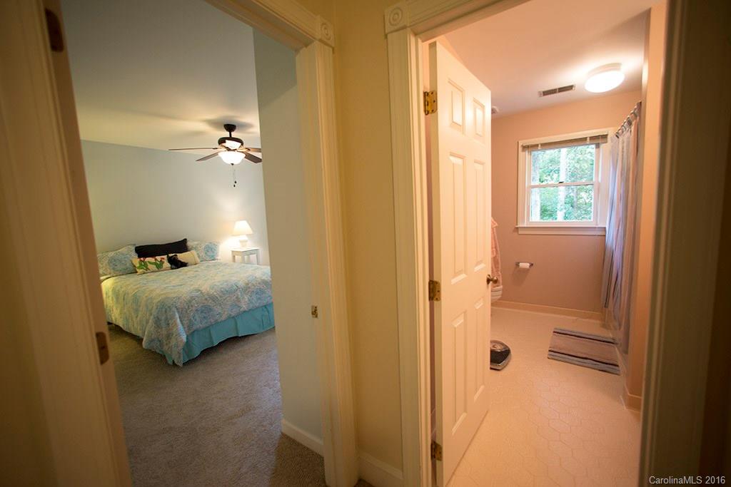 7226 Colony Road Charlotte, NC 28226 - Photo 13 of 24 a bathroom with a tub and shower