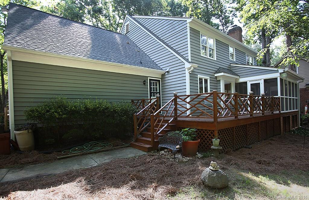 7226 Colony Road Charlotte, NC 28226 - Photo 19 of 24 a view of a house with a yard and a patio