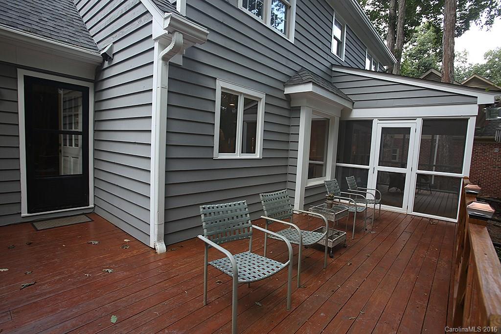 7226 Colony Road Charlotte, NC 28226 - Photo 20 of 24 a backyard of a house with wooden floor and outdoor seating