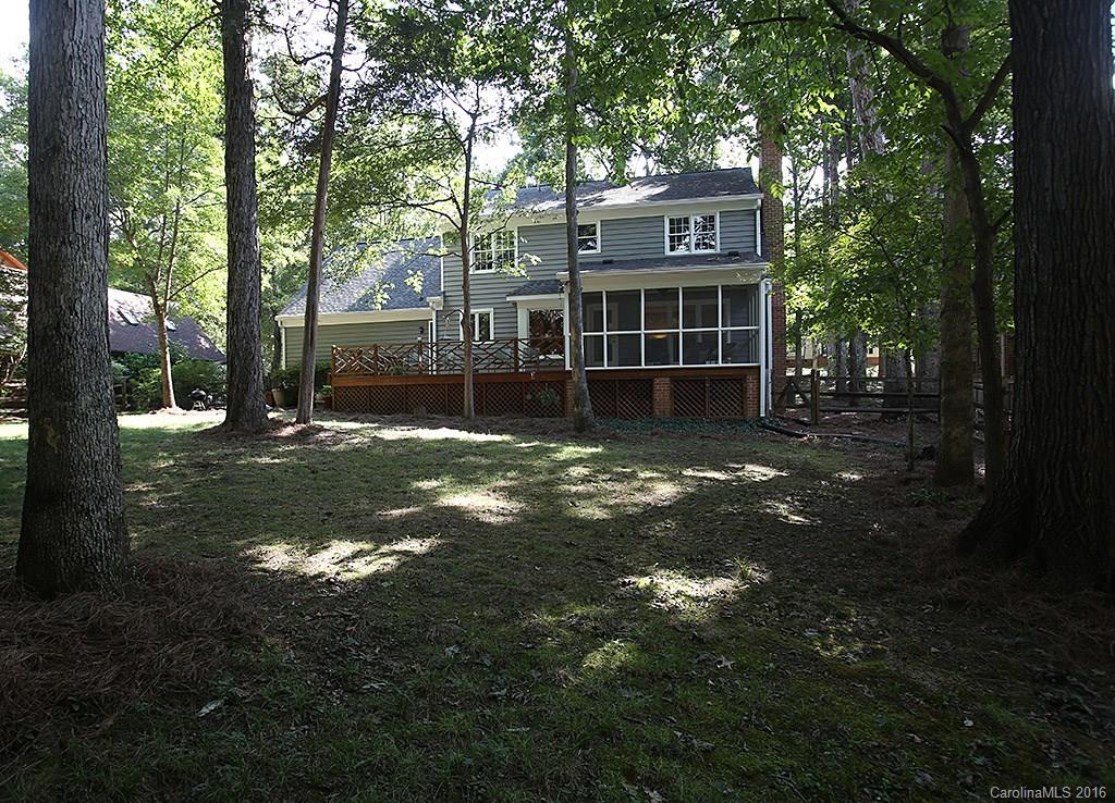 7226 Colony Road Charlotte, NC 28226 - Photo 21 of 24 a view of a big yard with plants and large trees